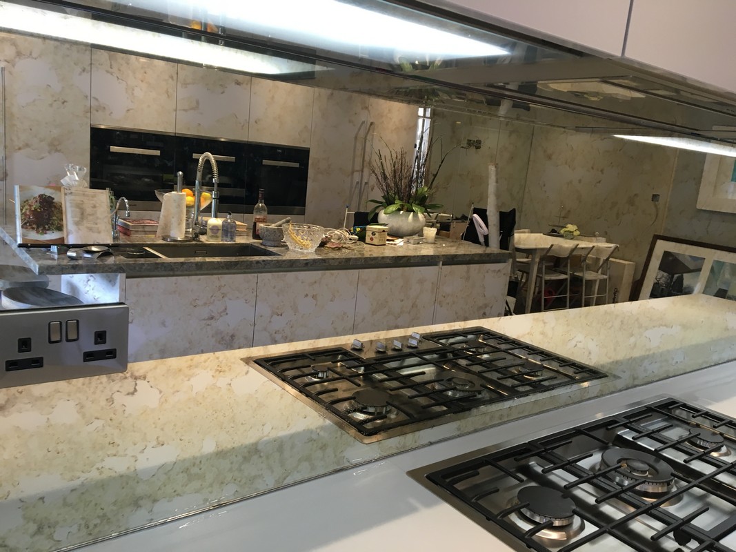 Mirror glass splashback in East Sheen luxury kitchen
